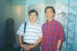 2000年与台北友人谢明勳先生在尹维新画展会上